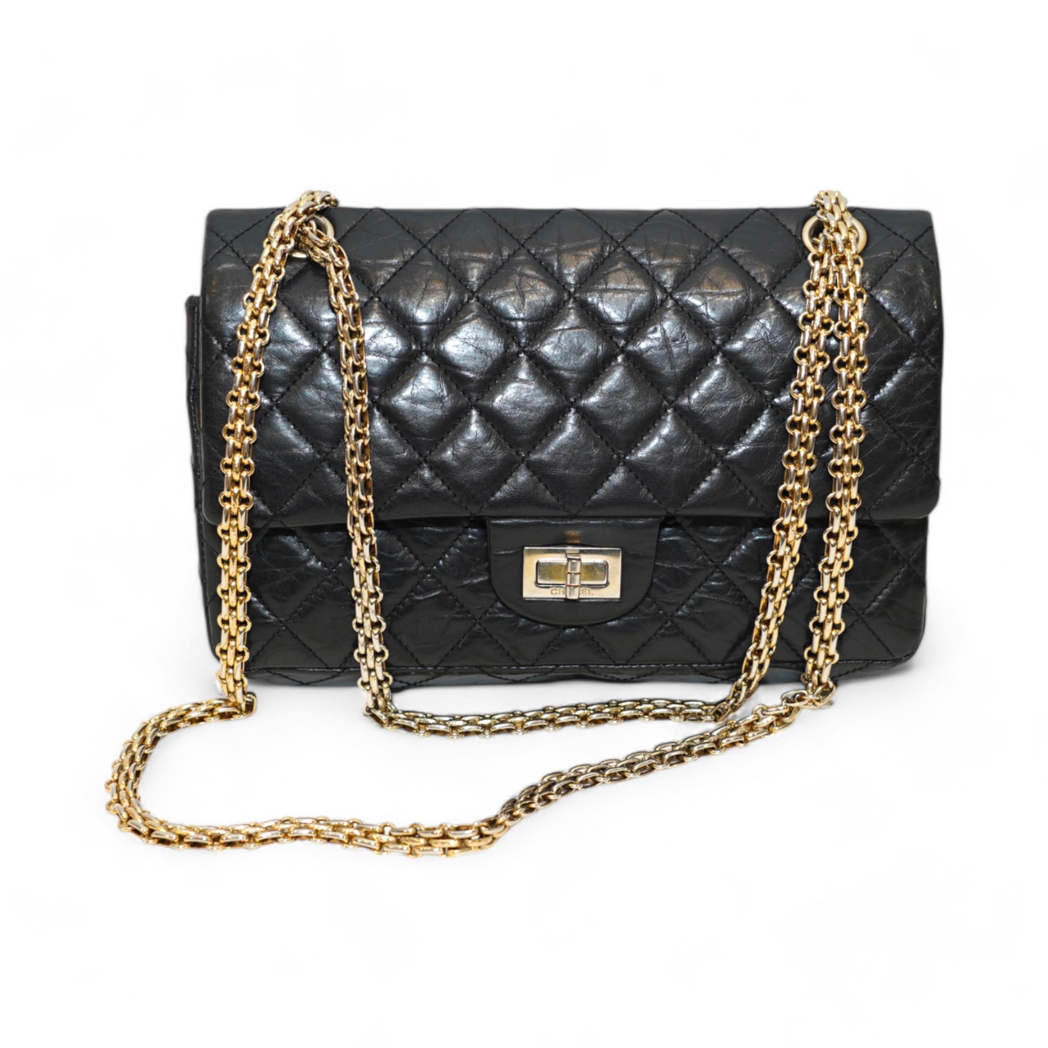 A Chanel 2.55 black leather handbag